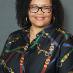 Melvette-Head-Shot-glasses-683x1024